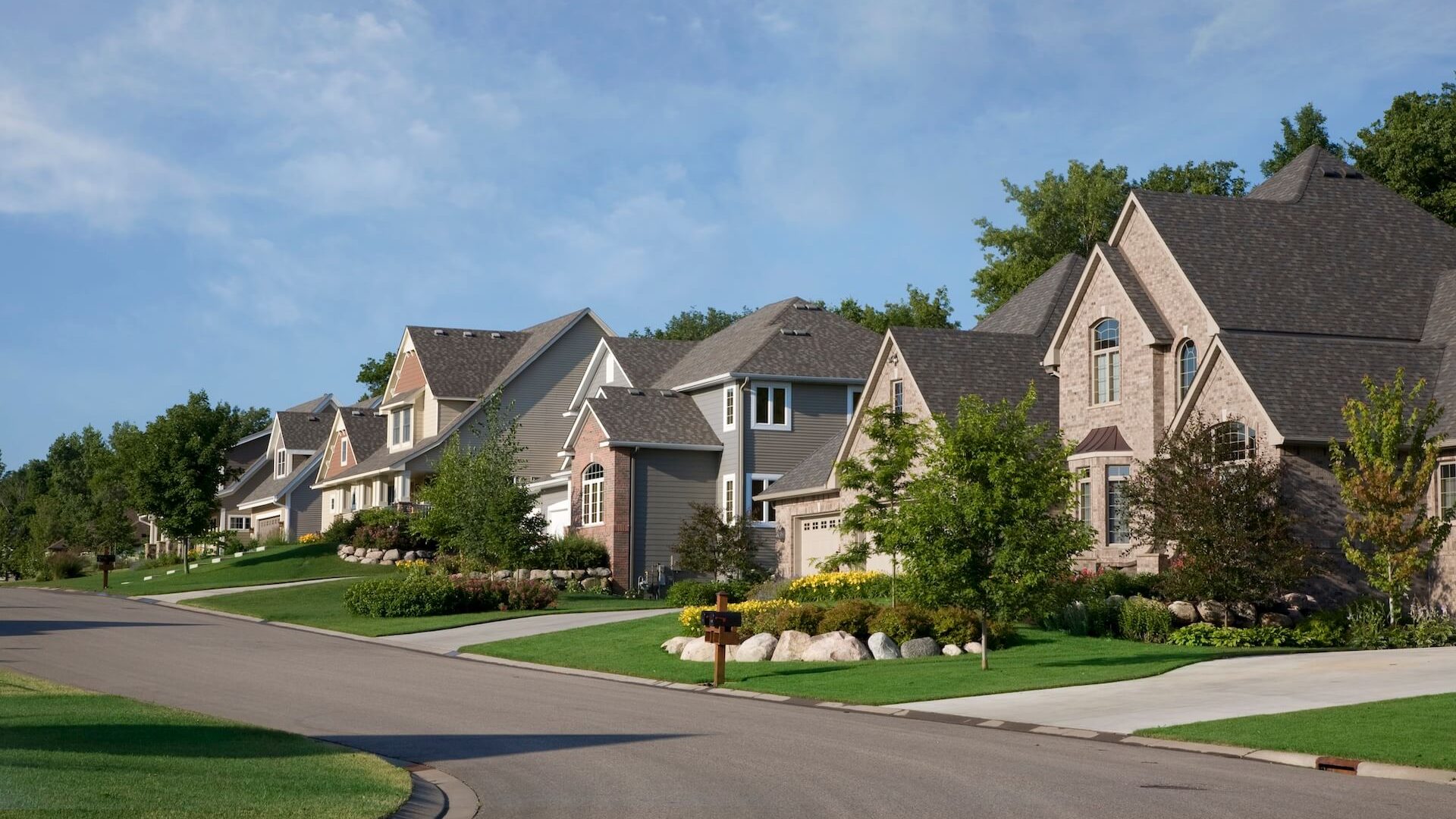 street-view-of-suburban-houses-on-a-sunny-day-2026-03-16-04-33-22-utc